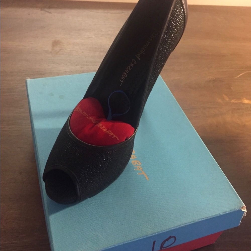 Black embossed snake print open toe pumps